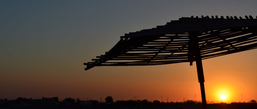 Couché de soleil avec un parasol (Fort Buchanan)